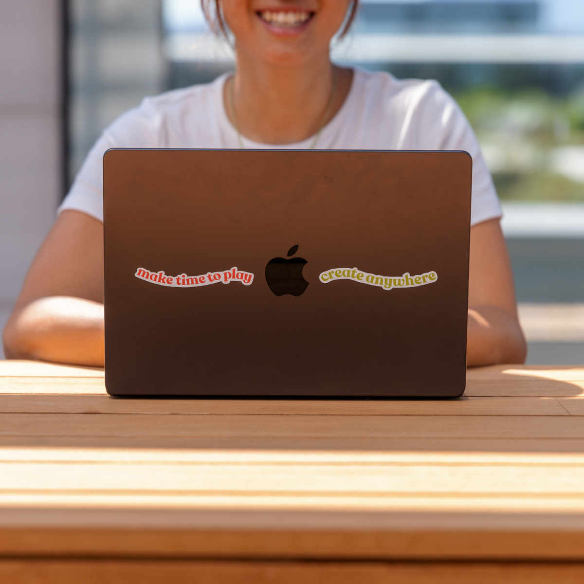 Wabi Blobi mantra sticker on a laptop