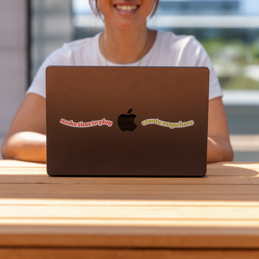 Wabi Blobi mantra sticker on a laptop