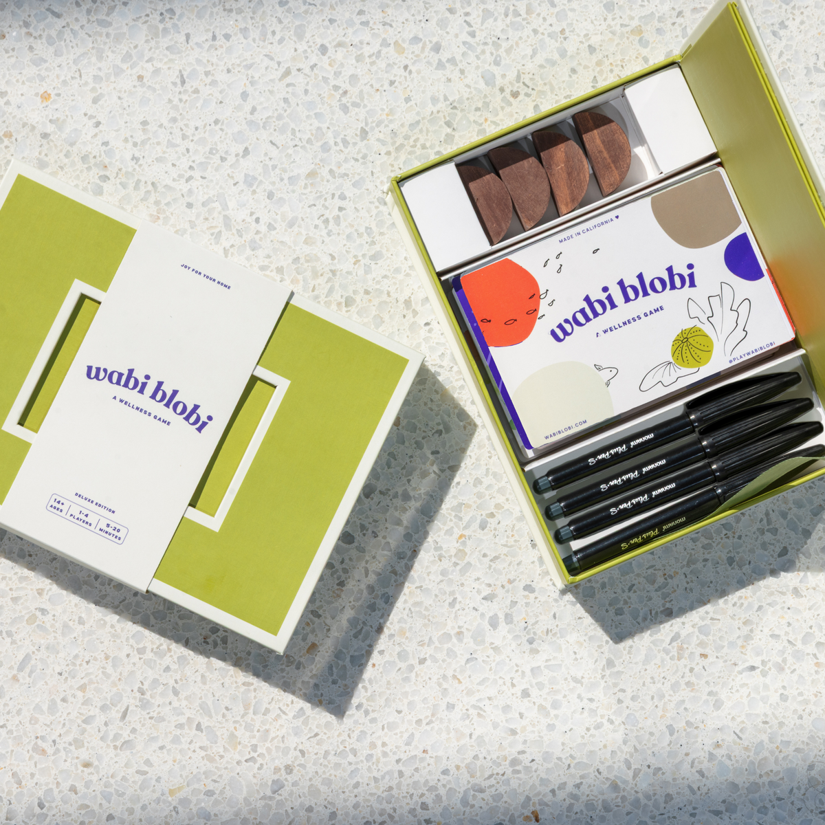 Wabi Blobi Deluxe Edition box with art pens and cards inside