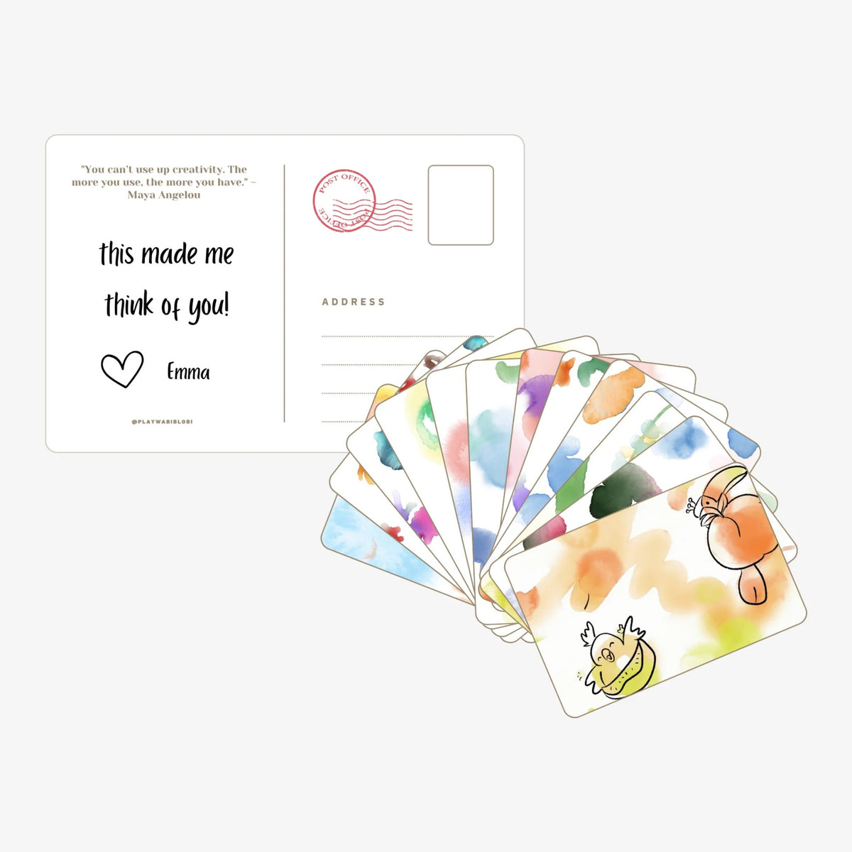 Wabi Blobi watercolor blob postcards fanned out next to a postcard back