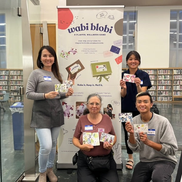 Wabi Blobi player with their doodled card