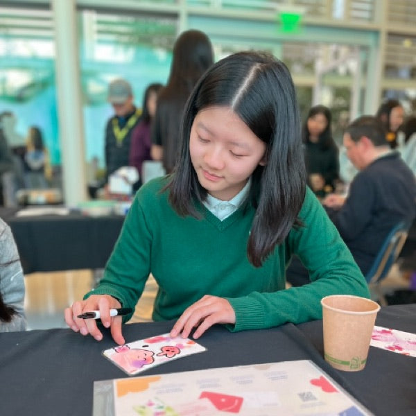 Wabi Blobi player with their doodled card