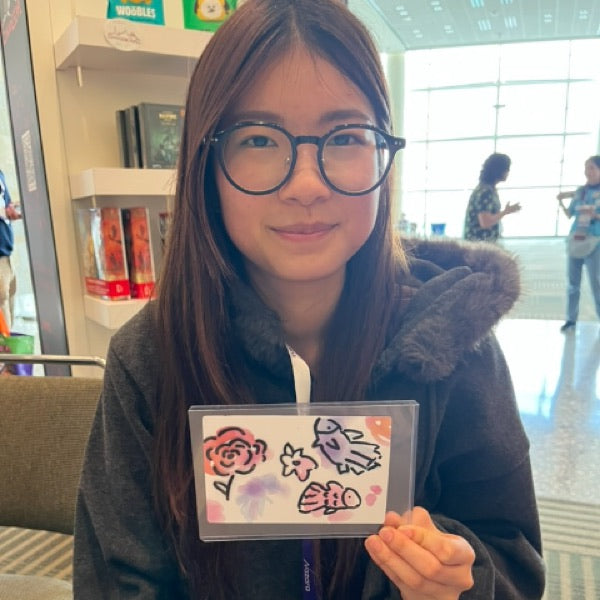 Wabi Blobi player with their doodled card